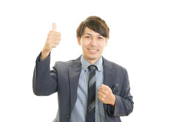 ガッツポーズのビジネスマン