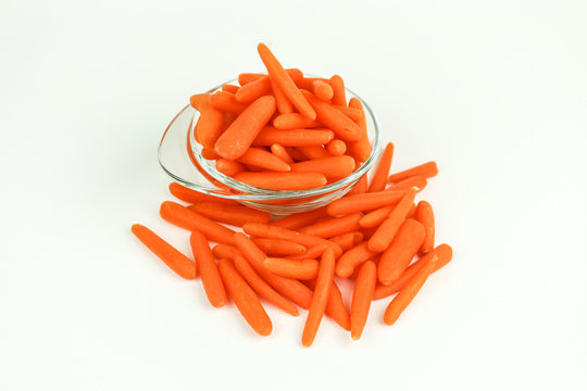 fresh baby carrots in a bowl