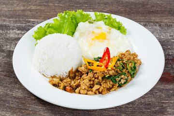 Rice topped with stir fried minced pork and basil