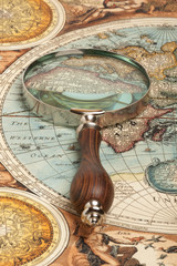 Naklejka na ściany i meble Magnifying glass and map