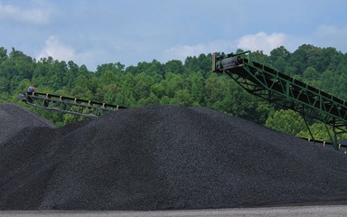 Two Large Piles of Coal