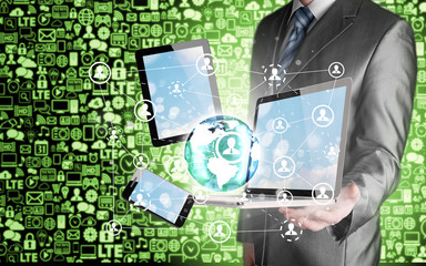 Business man using tablet PC and smartphone social connection