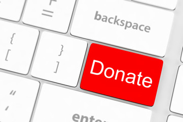 Fototapeta premium donate key word on computer keyboard,