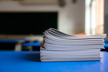 The exercise books on the desk
