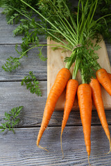 fresh carrots with tails