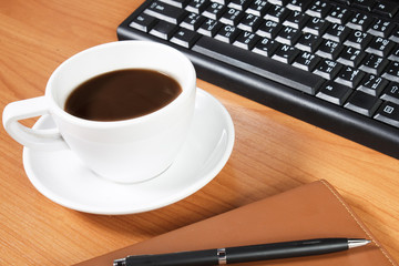 Office desk with coffee cup