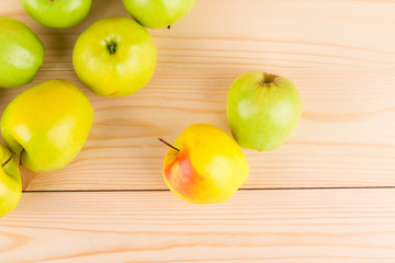 Apples on wooden table.