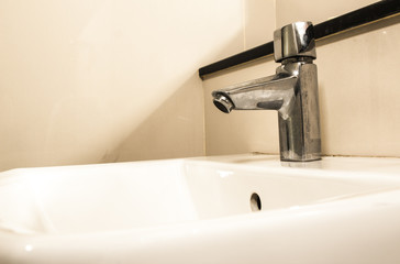 Water drop from faucet by Vintage