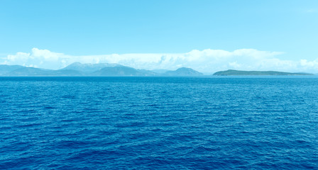 Naklejka na ściany i meble Sea summer view from ferry (Greece)