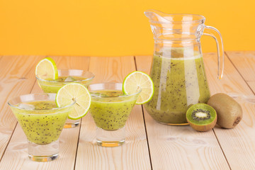 Kiwi fresh juice and fruits.
