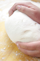 Hands Kneading Dough