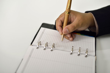 Business Man Writing On Agenda
