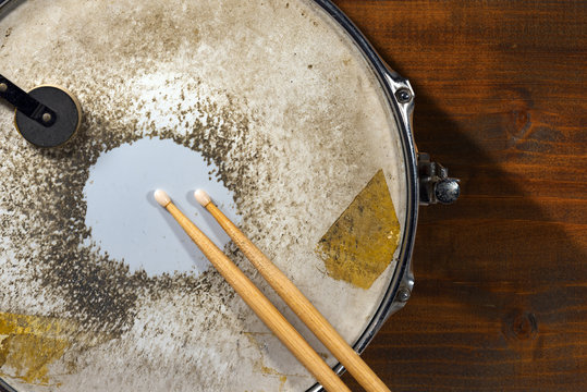 Old Metal Snare Drum with Drumsticks