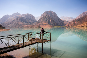 Girl relaxing near Iskanderkul lake, Tadjikistan.