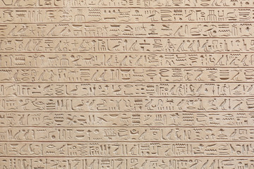 Egyptian hieroglyphs stone background - obrazy, fototapety, plakaty