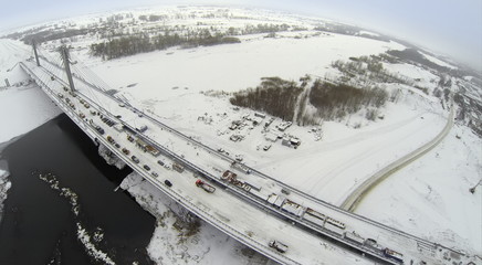 Fototapeta na wymiar Aerial view to Bridge under construction with different cars