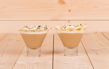 Banana milk smoothie in glass.