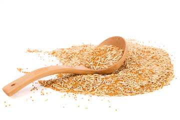 Wooden spoon of wheat with husk and purified.
