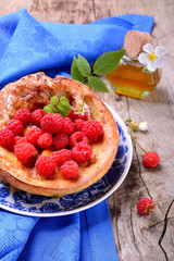 Dutch baby pancake with apple  cinnamon and fresh blueberry