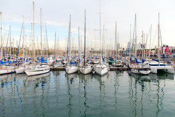 Fototapeta na wymiar Yachts in Barcelona harbor, Spain.