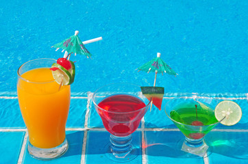 Orange juice and Cocktails near the swimming pool