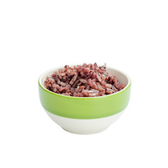 Black rice in a bowl isolated on white background
