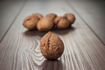 walnuts on the brown wooden table