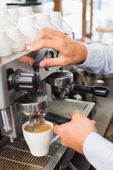 Barista making a cup of coffee