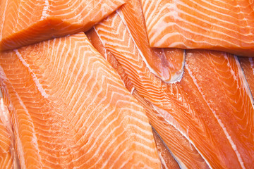 Salmon slices background. Close up.