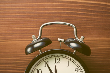 closeup of analog retro alarm clock