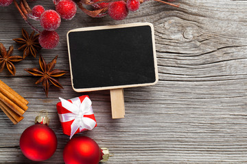 Christmas decoration on wood background, with free space for you
