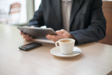 Man uses a digital tablet