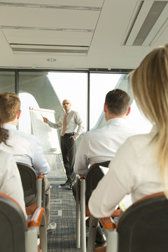 Group of businesspeople attending a seminar