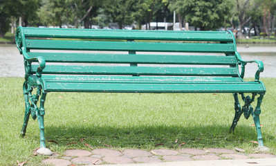 old green Bench in the park