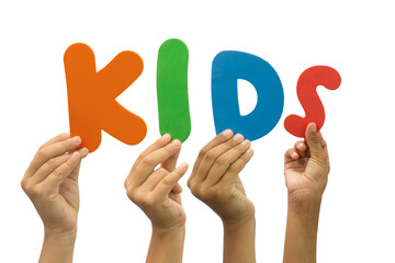 Multiple hands holding the word kids - 70847103