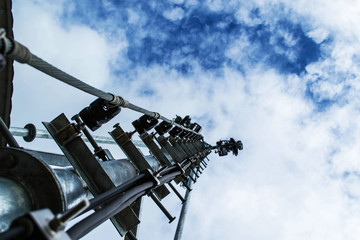 High mast metal structure telecommunication on tower with blue s