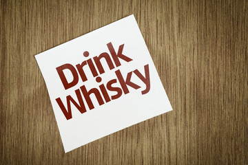 Drink Whisky on Paper Note with texture background