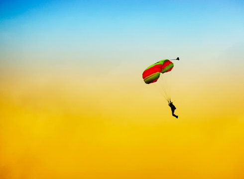 parachute against blue sky