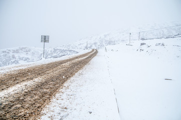 High mountain road with snow
