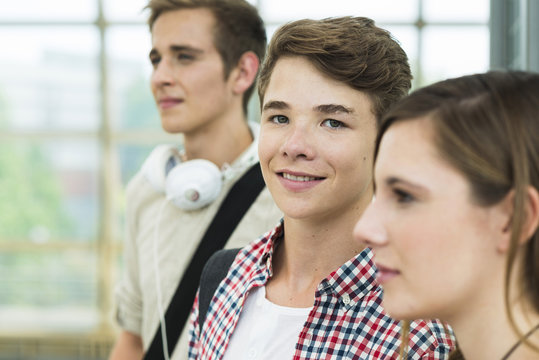 Portrait of friends at commuter train station
