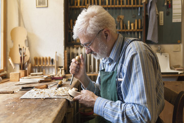Violin maker at work