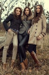 Three women posing outoor