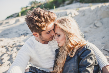 couple in love on the beach in autumn