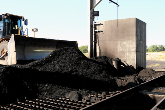 Front End Loader Pushing Coal Into Pulverizer