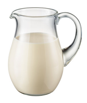 Glass pitcher of fresh milk isolated on white background. With c