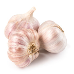Fototapeta premium Garlic cloves on white background
