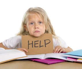 sweet schoolgirl holding help sign in stress with homework