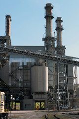 Outside of Steel Industrial Building Near Railway Tracks