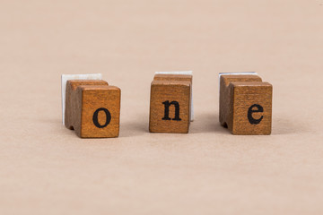 one written by wooden letters