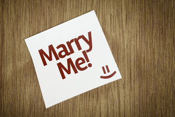 Marry Me! on Paper Note on texture background